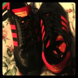 Sold They are red & black running Adidas lather