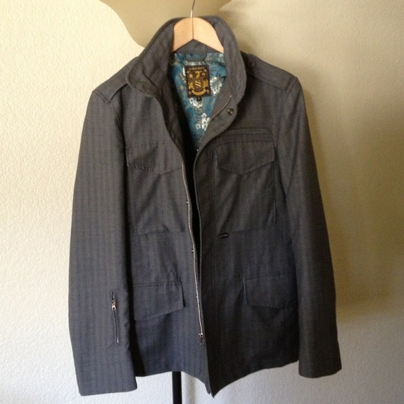 Subscript grey pin stripe men's coat