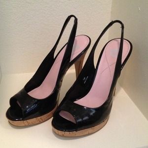 Black patten cork heel and platform 5 inch heel.