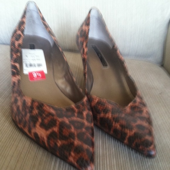 Animal print pat and leather pumps