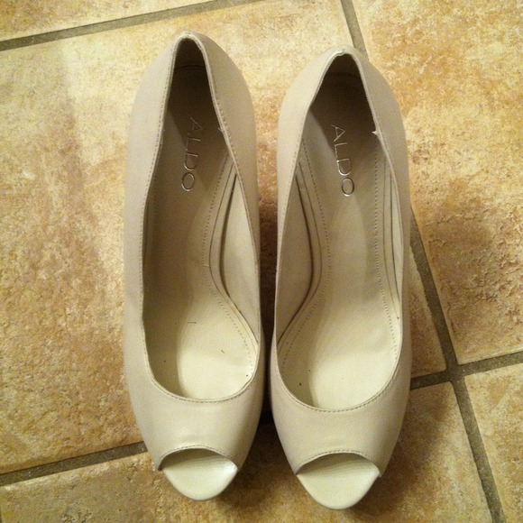 Nice pair of cream colored shoes.