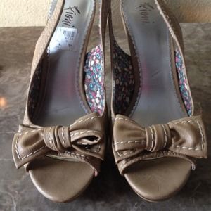Cute brown peep toe sling backs with bow on toe