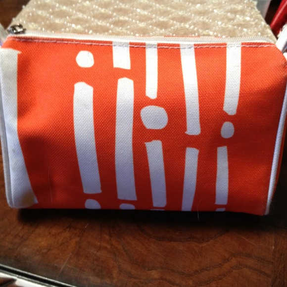 Orange/white make up bag