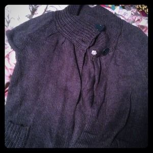A navy blue 3 button sweater