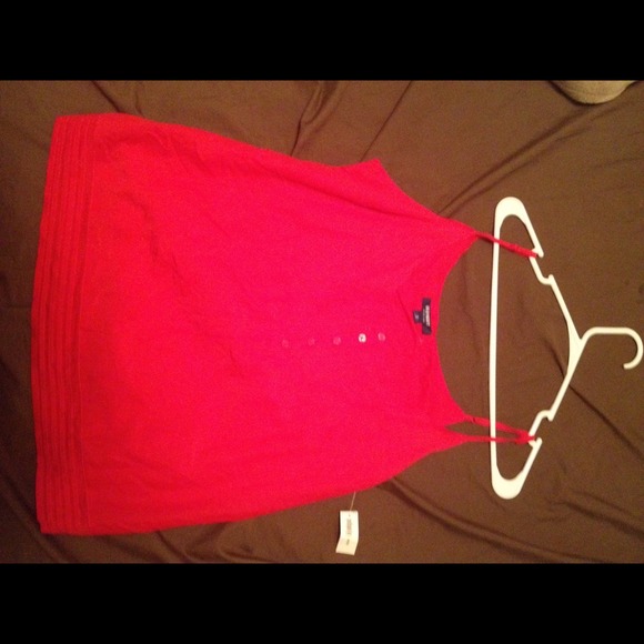 Red tank top with button front.