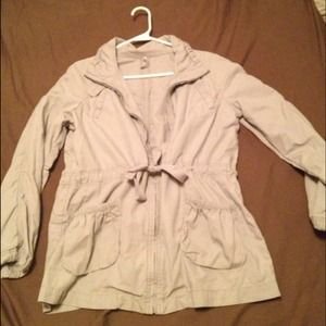 Thin grey jacket.