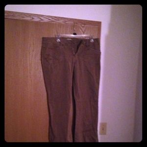 Size 13. Greyish brown khakis.