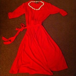 Red wraparound dress.