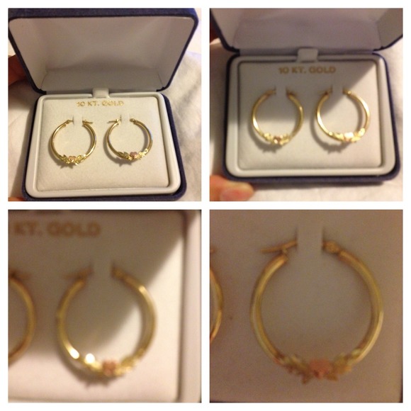 Reduced 10k gold hoops with heart design.