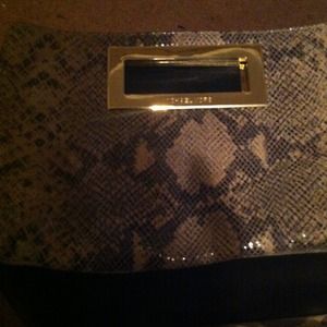 Snakeskin Michael Kors clutch with gold trimming
