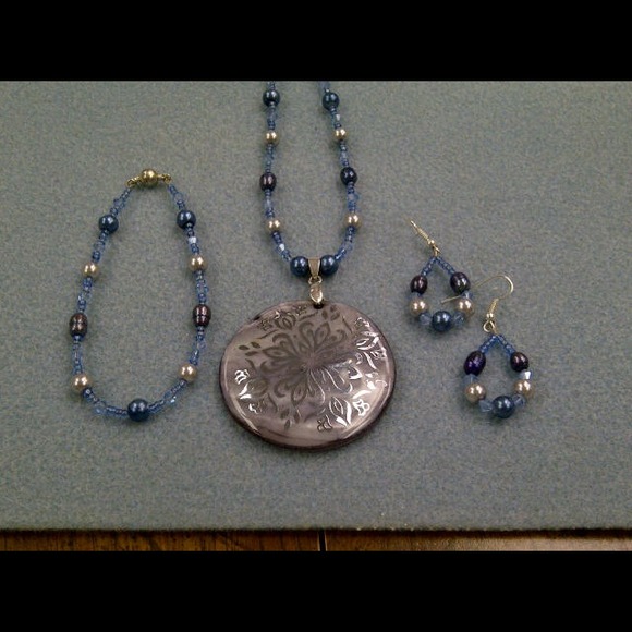 3 piece set of jewelry done in blues & silver