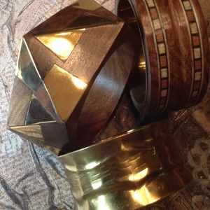 Group of three natural wood, brass and bangles.