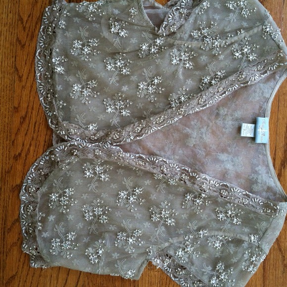 Feminine  jacket with pearls and crystals