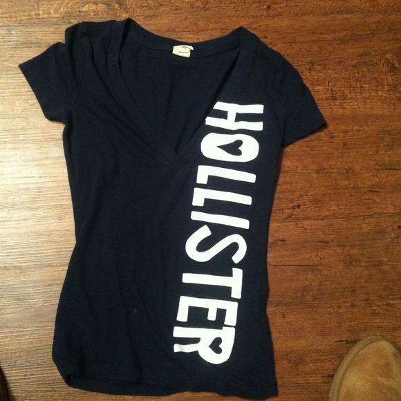 Hollister shirt. Navy blue short with a v cut.