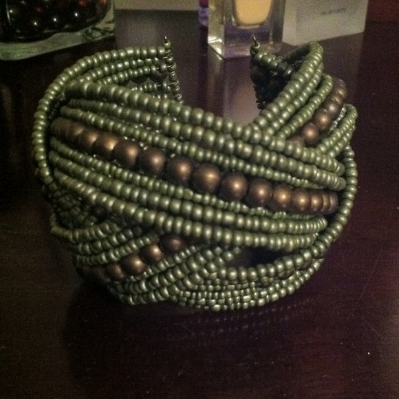Multi colored, three strand open back bracelet. - Picture 2 of 4
