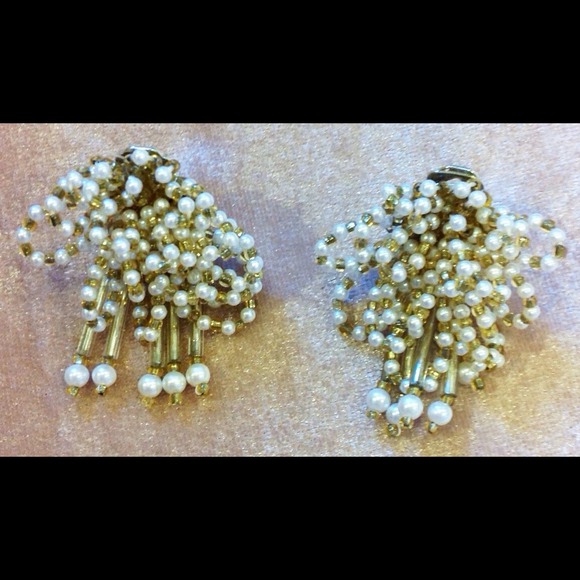 White beads and gold earrings