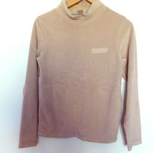 Beige Fleece Sweater with Two Pockets on Side.