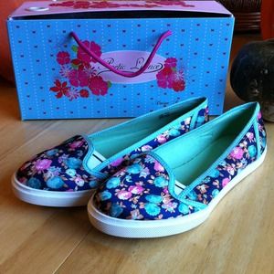 Floral slip on tennies by Poetic License
