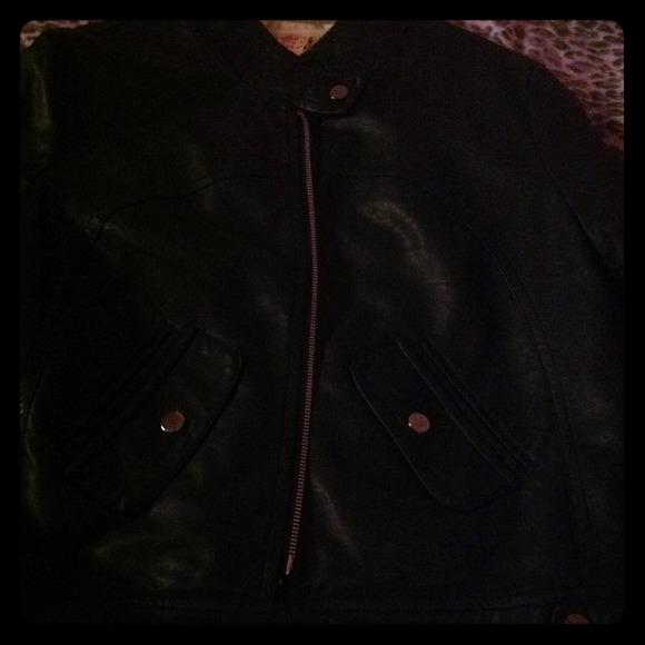 Leather jacket with cheetah lining