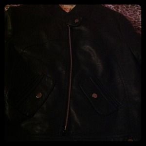 Leather jacket with cheetah lining