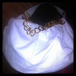 White with gold accent juicy couture purse!