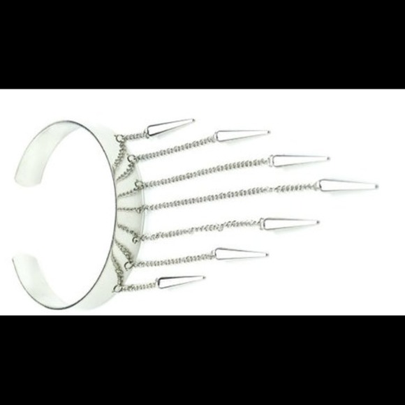 Silver alloy adjustable upper arm cuff.