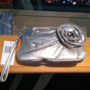 Silver zipper detail clutch.