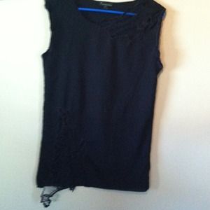 Navy blue top with lace detail.