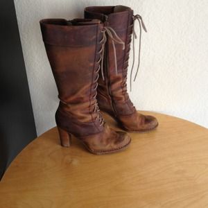 Distressed leather Frye boots.
