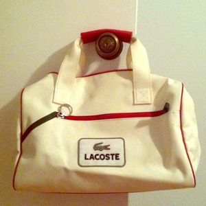 Authentic Lacoste purse. Cute and casual.