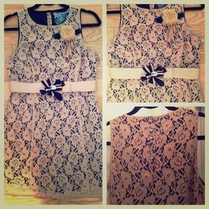 Tan lace dress with black lining and belt
