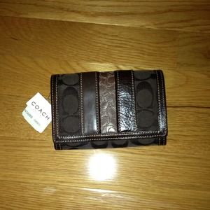 RESERVED! Authentic Coach wallet in brown.