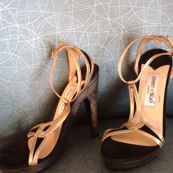 Jimmy Choo with black wooden heal