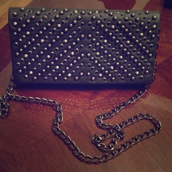 Studded clutch bag by Aldo