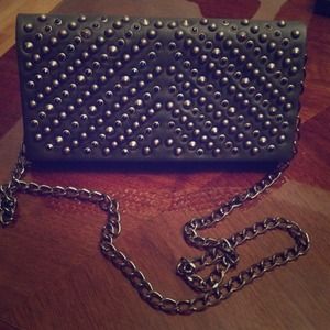 Studded clutch bag by Aldo