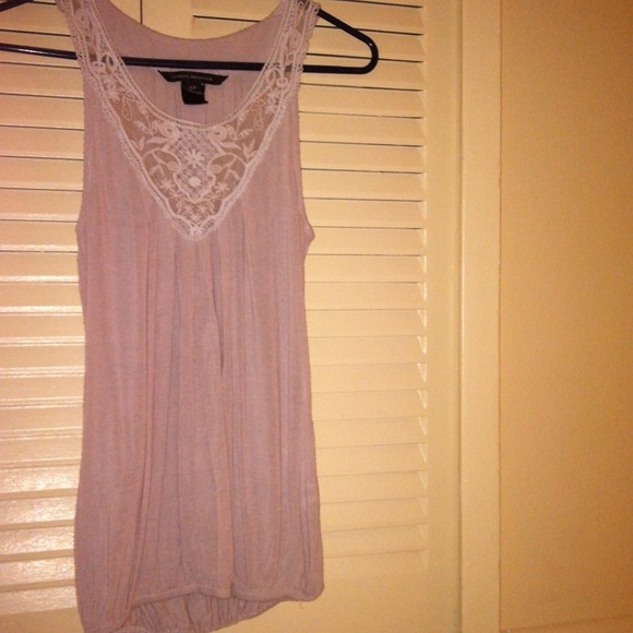 beige top with laced neckline