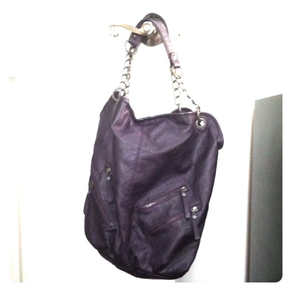 Converse leather purple purse. Very spacious