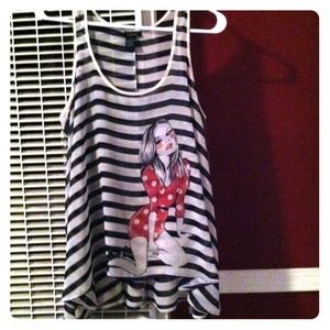 Black and white striped tank w/model.