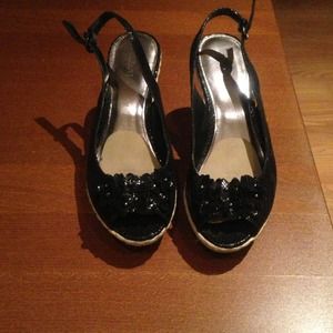 3.5 inch heel. Black. Sling back