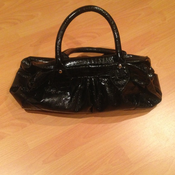 Black shinny express purse
