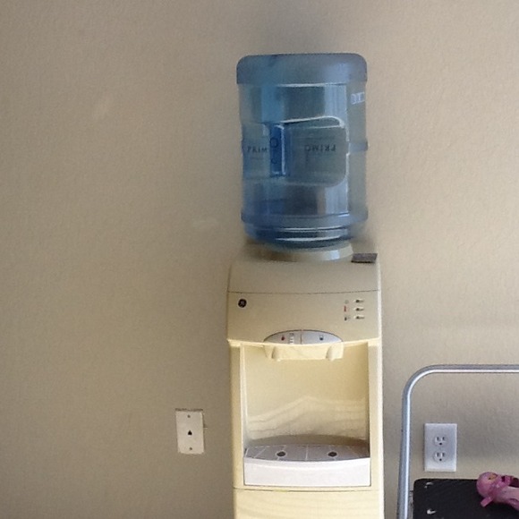 Water cooler with 3 bottles
