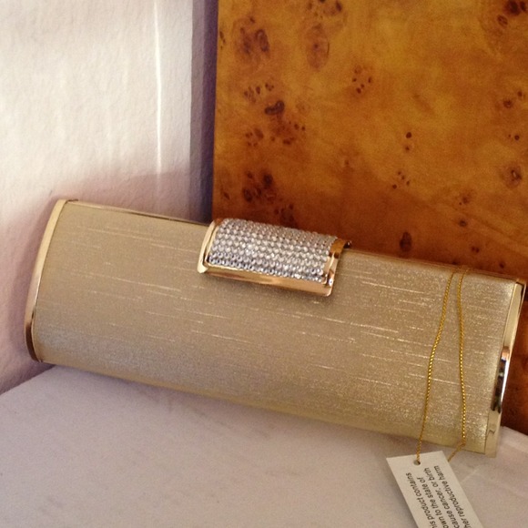 Clutches & Wallets - Gold metal clutch handbag with Swarovski crystal