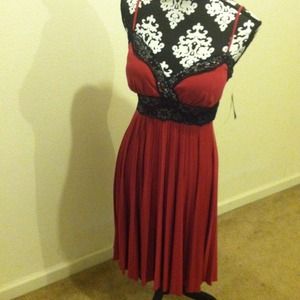 Brand new beautiful dark pink/black dress