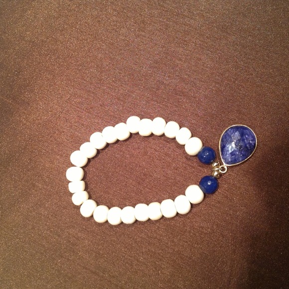Handmade bone beads and lapiz azule pendant.
