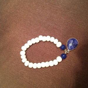 Handmade bone beads and lapiz azule pendant.