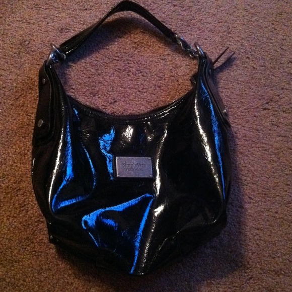 SOLD Vera Wang black purse