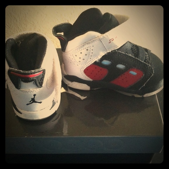 Size 2 maroon and black Jordans