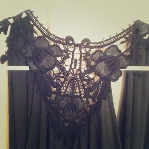 Sleeveless cardigan w/lace back