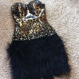 Cheetah print sequin designer cocktail dress.
