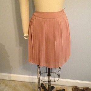 Pleated beige knee high skirt